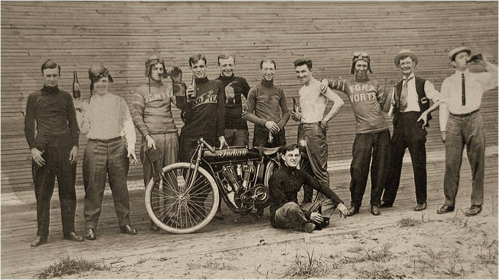 Racers hamming it up for the cameraJoseph Baribeau sitting in front of the Indian Motorcycle