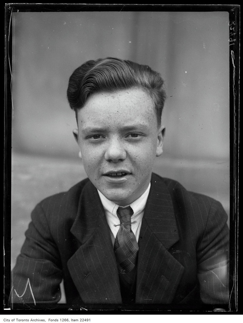 Eastern [School of] Commerce [commencement portraits], Lawrence Newnham.