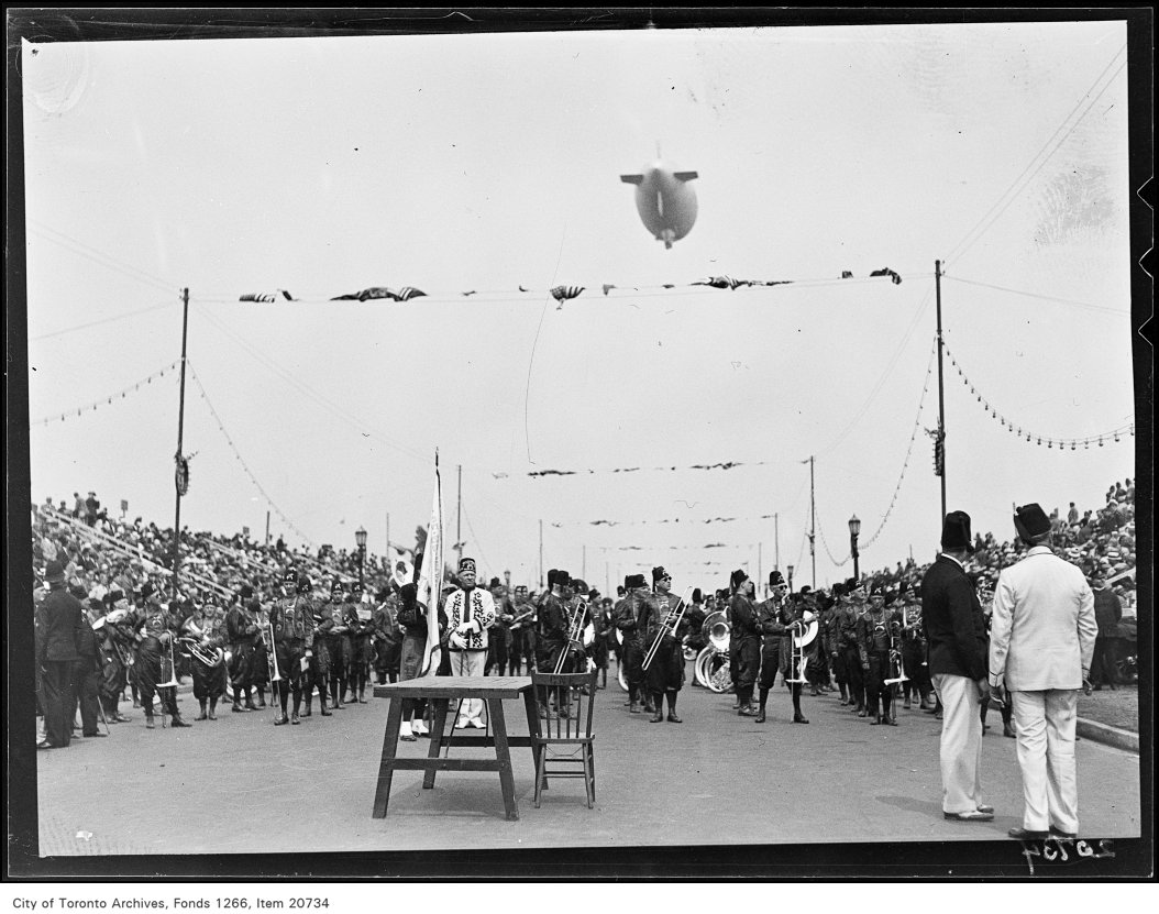 Shrine Peace Parade, Parade on Boulevard, blimp overhead.